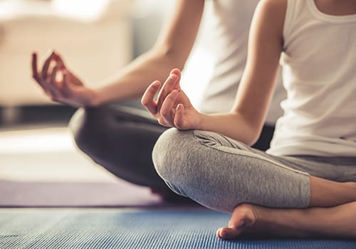Two people engaged in holistic therapy.