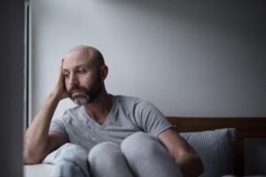 Man experiencing opioid withdrawal symptoms