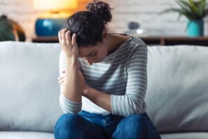 Woman experiencing signs of alcohol withdrawal