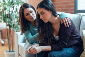 Woman demonstrating how to help a loved one with alcohol addiction