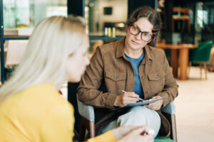 A woman learning about PHP benefits