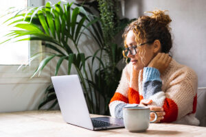 A woman reading about life skills training