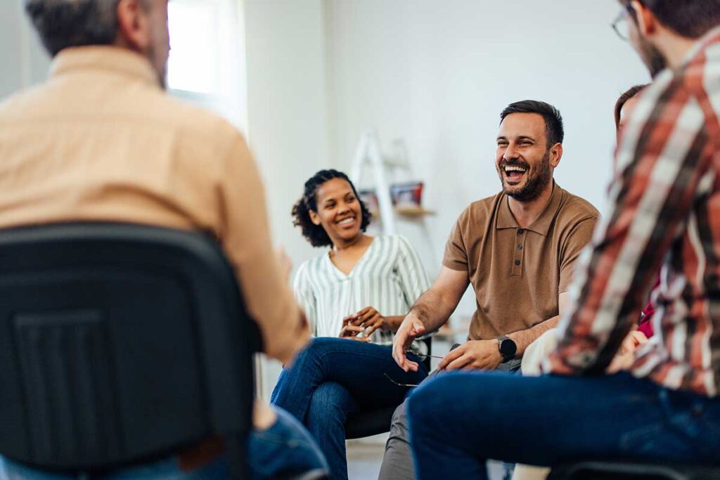 Group of people learning what to expect in a MAT program