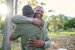 A man displaying how to support someone in rehab