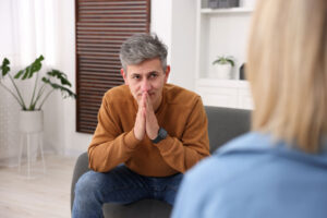 A man wondering, "Can fentanyl addiction be treated?"